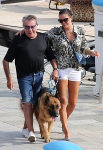 EXCLUSIVE: EXCLUSIVE August 14, 2015 - Calvi, CORSICA - Roberto Cavalli and his girlfriend Lina Nilson with dogs spotted in Calvi Pictured: Roberto Cavalli and Lina Nilson Ref: SPL1101935 150815 EXCLUSIVE Picture by: Splash News Splash News and Pictures Los Angeles:310-821-2666 New York: 212-619-2666 London: 870-934-2666 photodesk@splashnews.com 